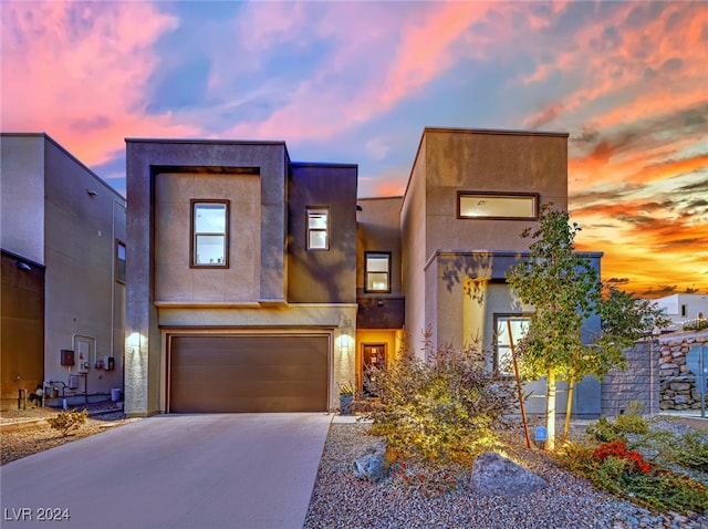 view of front of home with a garage