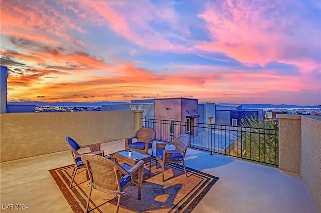 view of patio terrace at dusk