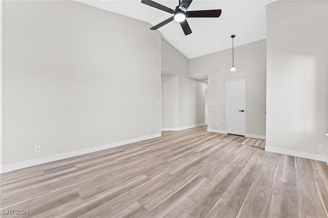 unfurnished living room featuring ceiling fan, high vaulted ceiling, and light hardwood / wood-style floors