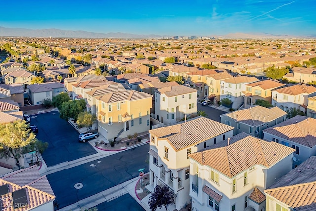 birds eye view of property featuring a mountain view