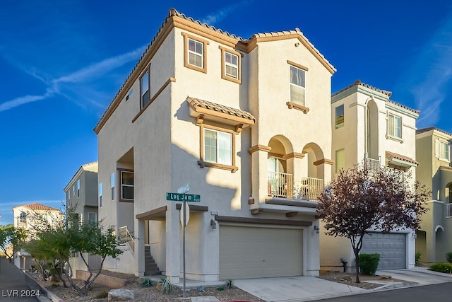 view of front of property featuring a garage