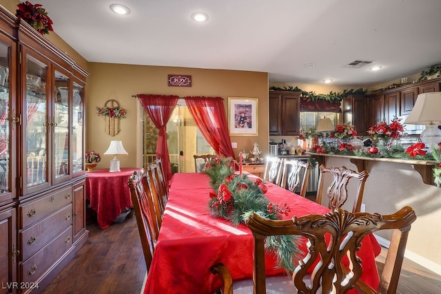 dining room featuring dark hardwood / wood-style flooring