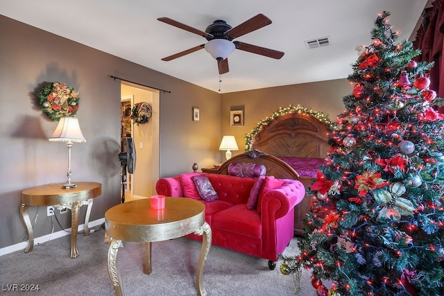 carpeted bedroom with ceiling fan