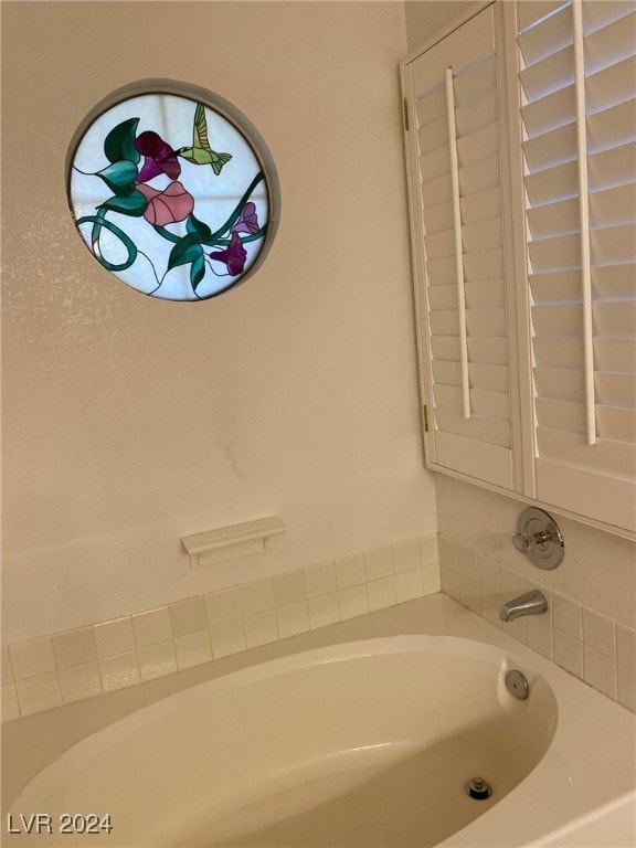 bathroom featuring a bathing tub