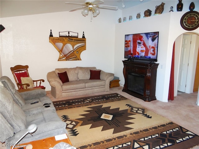 living room featuring ceiling fan and carpet floors