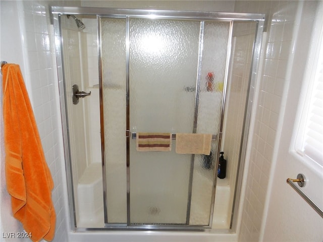 bathroom featuring an enclosed shower