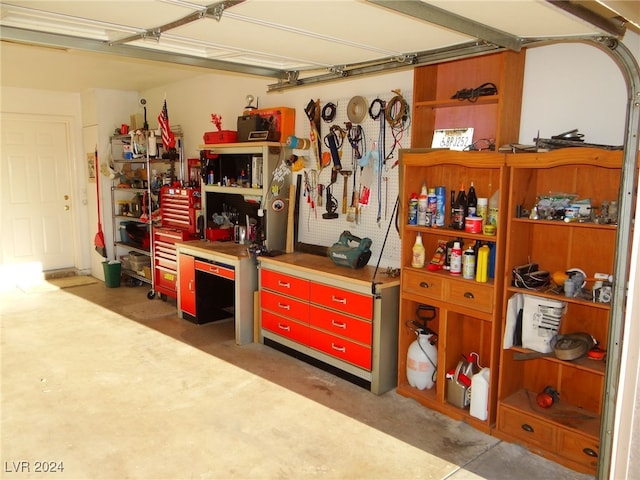 garage with a workshop area