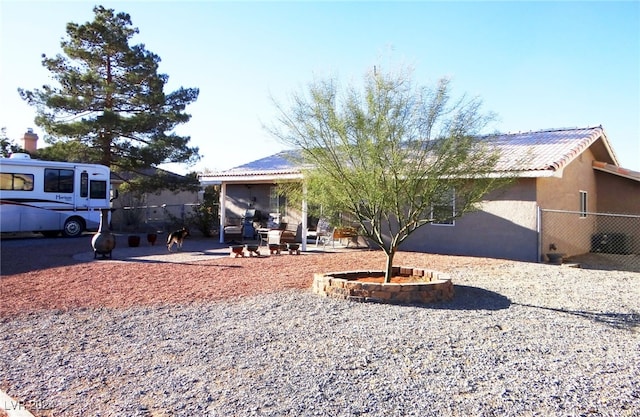 view of front of home featuring a patio area