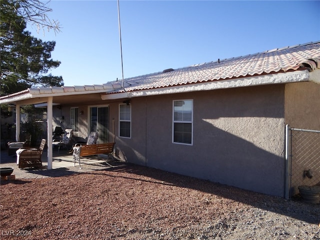 back of house featuring a patio