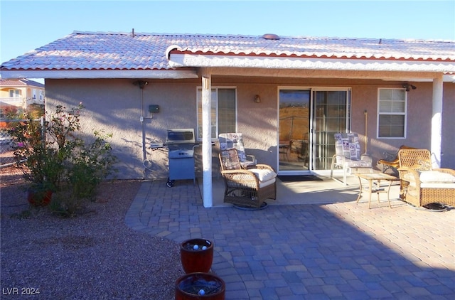 back of house featuring a patio area