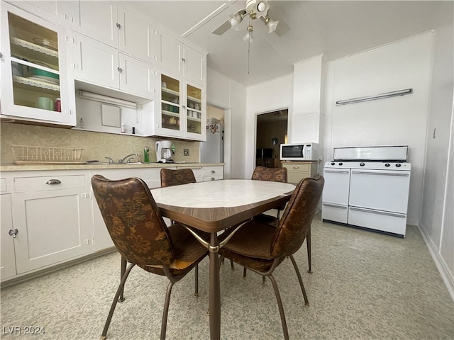 dining space featuring ceiling fan