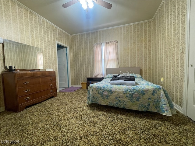 bedroom featuring ceiling fan, carpet, and ornamental molding