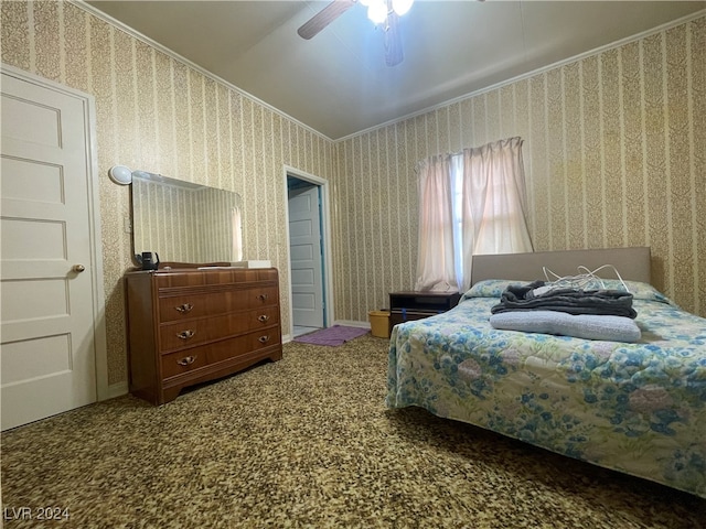 bedroom with ceiling fan, carpet, and lofted ceiling