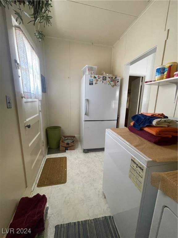 kitchen featuring refrigerator and white refrigerator