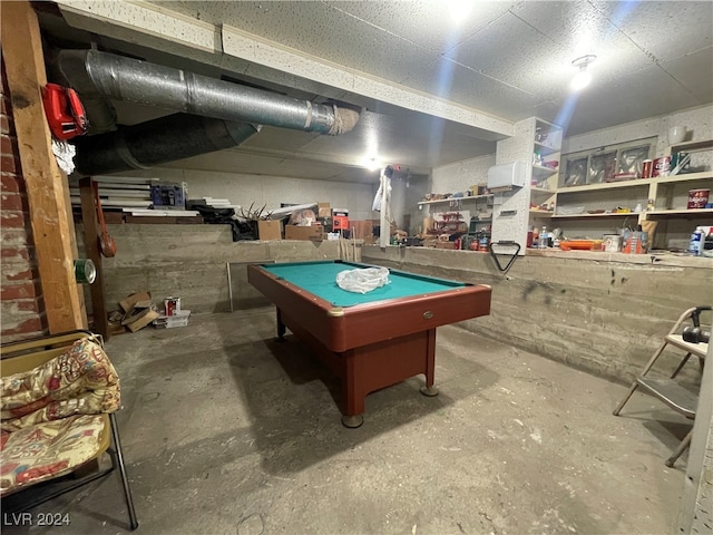 playroom with billiards and concrete floors