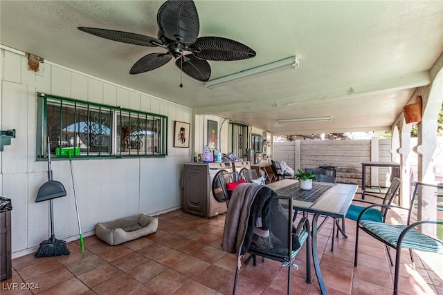 view of patio / terrace featuring a ceiling fan and fence