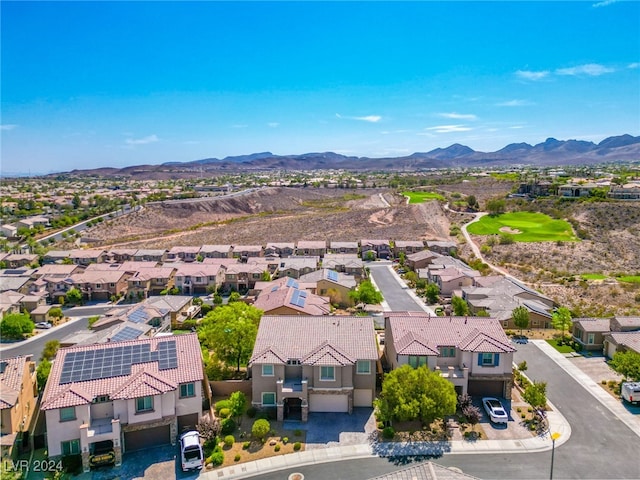 birds eye view of property featuring a mountain view