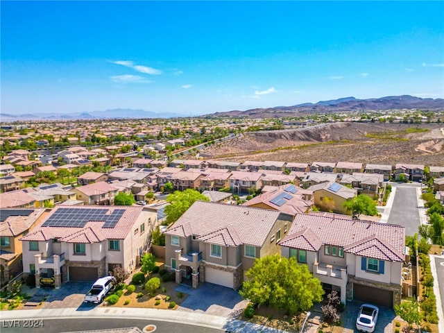 drone / aerial view featuring a mountain view