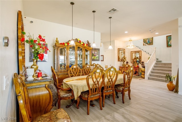 dining area featuring light wood-type flooring