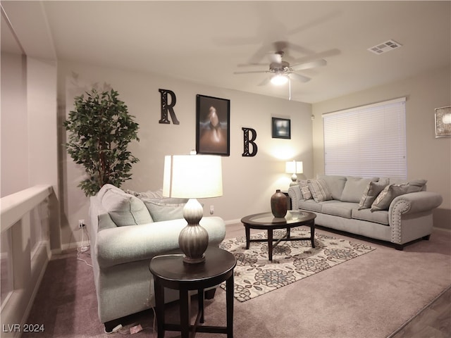 living room featuring ceiling fan