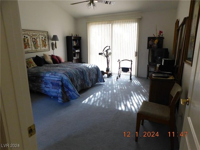 bedroom with ceiling fan, carpet floors, and vaulted ceiling