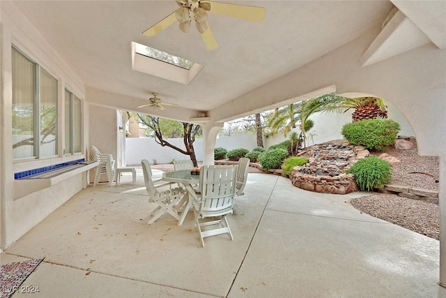 view of patio featuring ceiling fan