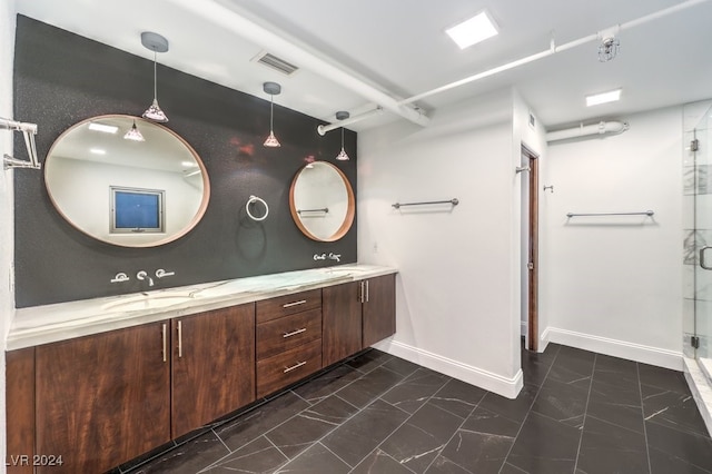 bathroom with vanity and walk in shower