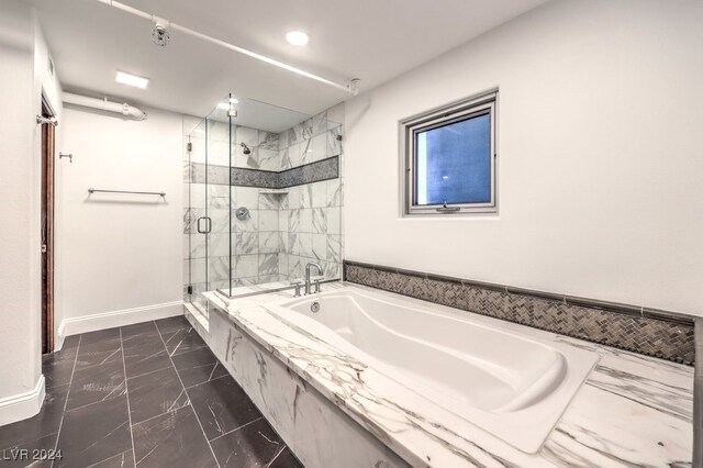 bathroom featuring plus walk in shower