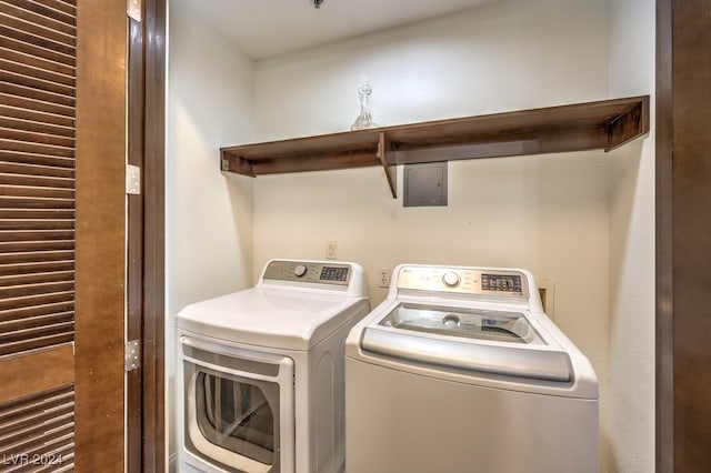 clothes washing area with independent washer and dryer