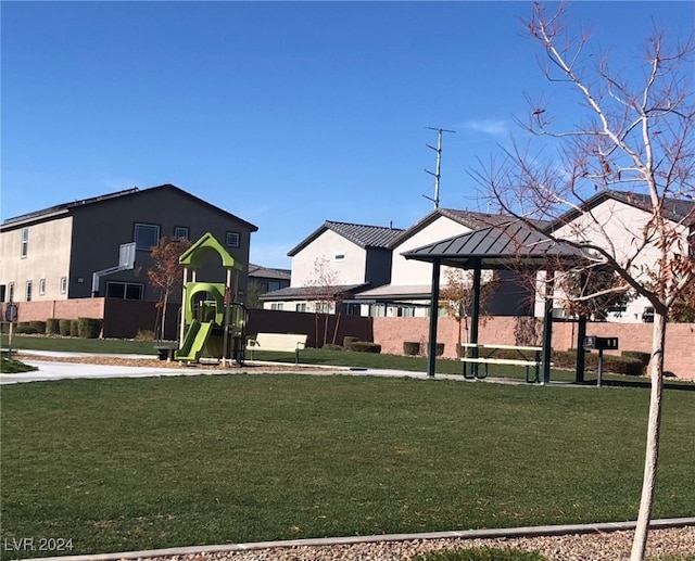 view of home's community with a playground, a yard, and a gazebo