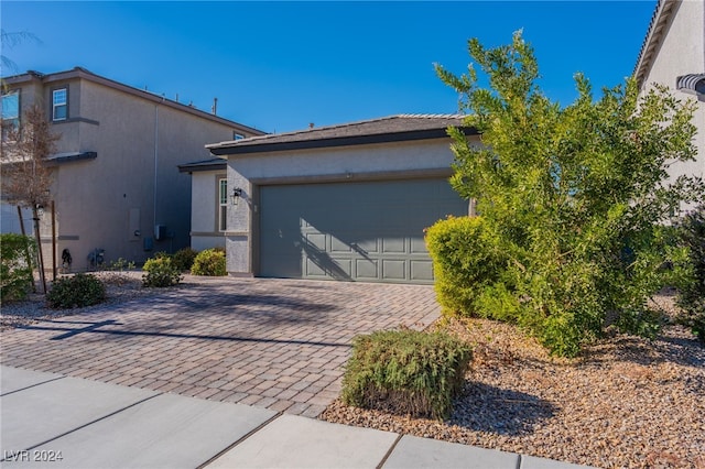 view of front of home with a garage