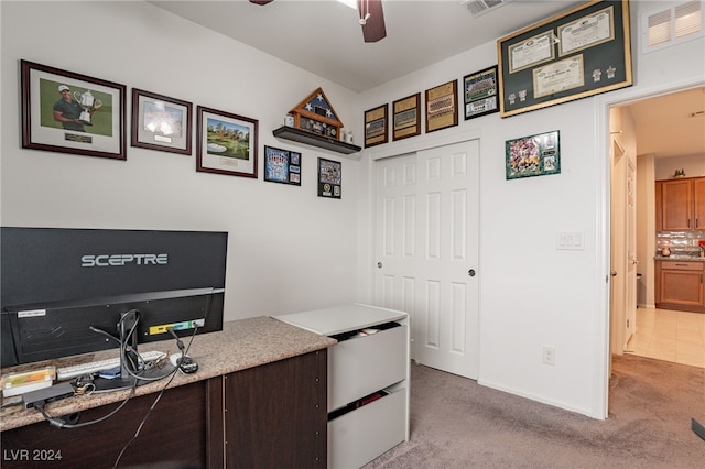 office featuring ceiling fan and light colored carpet