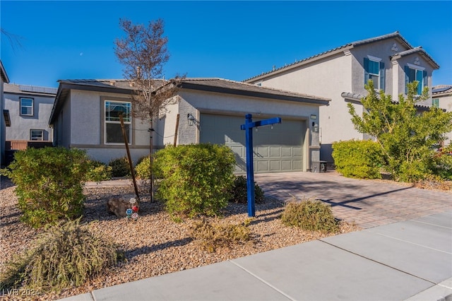 view of side of property featuring a garage