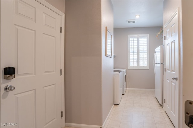 laundry area featuring washer and clothes dryer