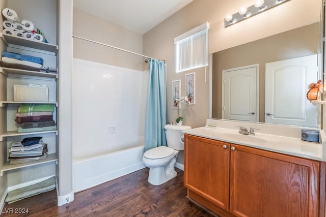 full bathroom featuring hardwood / wood-style flooring, shower / bathtub combination with curtain, vanity, and toilet