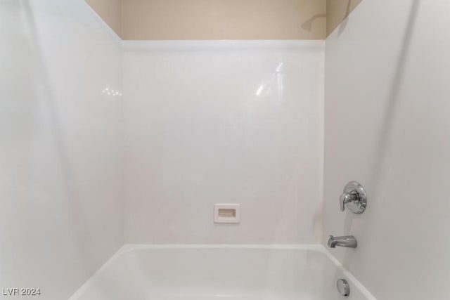 bathroom with shower / bathing tub combination