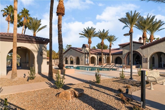 view of pool featuring a patio area