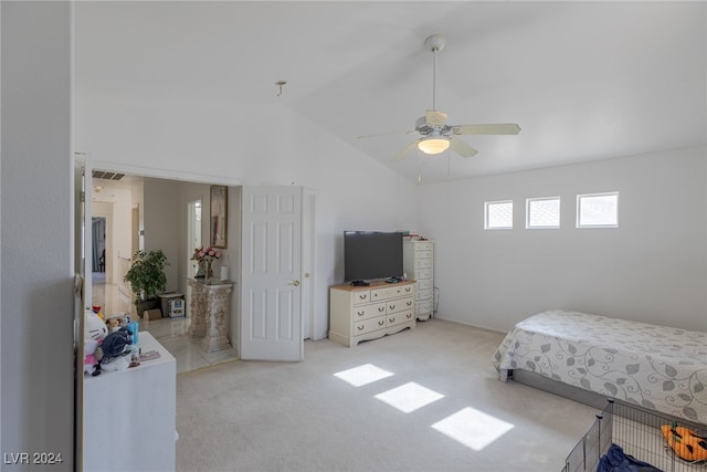 bedroom with ceiling fan, light colored carpet, and lofted ceiling