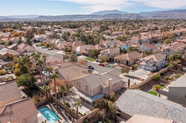 drone / aerial view featuring a mountain view