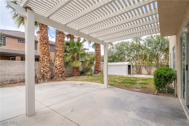 view of patio / terrace with a pergola and an outdoor structure