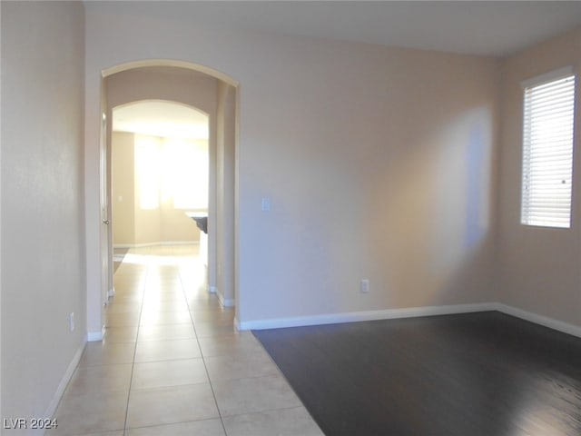 spare room featuring light hardwood / wood-style floors