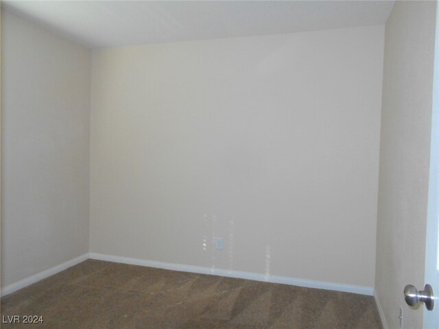 empty room featuring carpet flooring