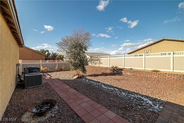 view of yard featuring central AC unit