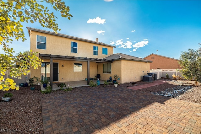 back of property with a patio area