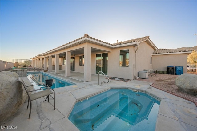 view of pool featuring a fenced in pool, a patio, a ceiling fan, and fence