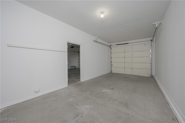 garage featuring baseboards