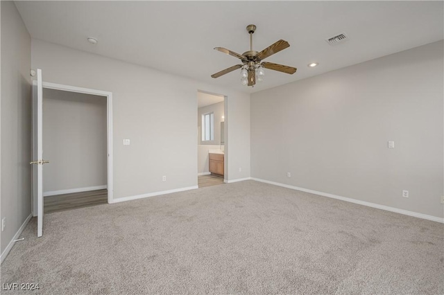 unfurnished bedroom with recessed lighting, visible vents, baseboards, and carpet flooring