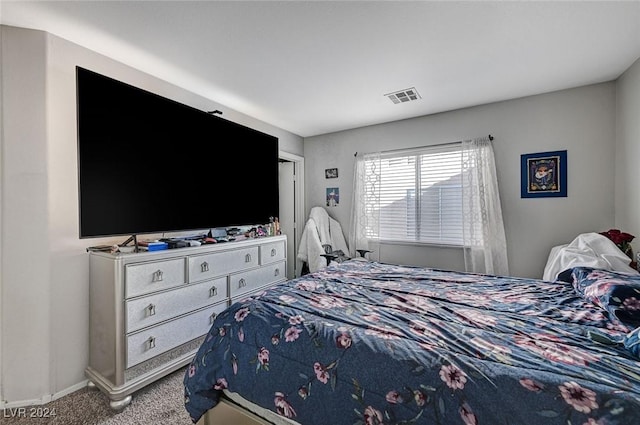 bedroom featuring carpet floors