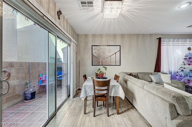 dining room with light hardwood / wood-style flooring