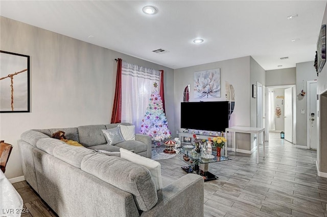 living room with light hardwood / wood-style floors